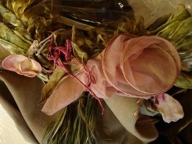 silk organza flowers, leather flowers biat feathers grace neckline